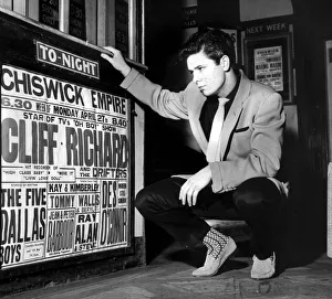 CLIFF RICHARD LOOKING AT CONCERT POSTER WITH HIS NAME AS TOP-BILLING - 1958 CLIFF RICHARD LOOKING AT CONCERT POSTER WITH HIS NAME AS TOP-BILLING - 1958