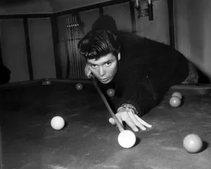 Cliff Richard playing pool in his new home Rookswood, Essex, UK Cliff Richard playing pool in his new home Rookswood, Essex, UK