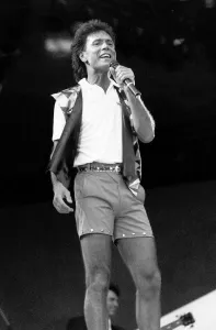 Football Stadium Gallery: Cliff Richard singer and actor in concert on stage in Wembley. June 1989