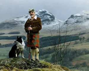 Climber Sandy Cousins with collie dog in the Highlands 1994 Climber Sandy Cousins with collie dog in the Highlands 1994