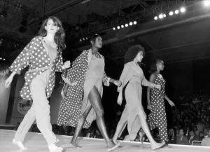 00492 Gallery: Clothes Show Live, models in spots and dresses slit to the waist stride out