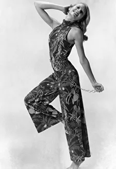 Clothing Beach. All in one floral halterneck jumpsuit with chain belt Clothing Beach. All in one floral halterneck jumpsuit with chain belt