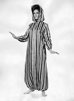 Clothing Beach. Andy Pandy style hooded striped outfit. July 1964 P017996 Clothing Beach. Andy Pandy style hooded striped outfit. July 1964 P017996