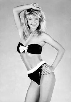 Clothing Beach. Sultry charm frilly knicker bikini with bow and a host of roll up Clothing Beach. Sultry charm frilly knicker bikini with bow and a host of roll up