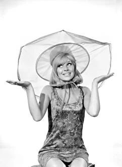 Images Dated 4th December 2007: Clothing: Fashion: Hats: Woman wearing umbrella hat. Model: Marilyn Rickard