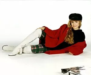 Images Dated 11th November 1990: Clothing Fashion from Miss Selfridge model in white boots tartan leggings black top hat