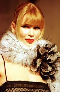 Clothing by Valentino 1998 Claudia Schiffer Model wearing black evening dress with Clothing by Valentino 1998 Claudia Schiffer Model wearing black evening dress with
