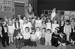 Images Dated 1st December 1985: A clown and Father Christmas visiting Kemplah Primary School, Guisborough. December 1985
