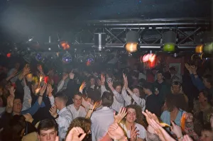 Clubbers get hot and sweaty enjoying a rave Clubbers get hot and sweaty enjoying a rave