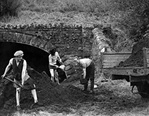 The coal is dredged in buckets from the bed of Sir Hony River at Fontllanfraith The coal is dredged in buckets from the bed of Sir Hony River at Fontllanfraith