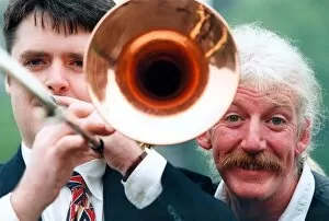 Images Dated 30th May 1996: Comedian Brendan Healey (right) with trombone player Mitch Johnson from Dickinson Dees