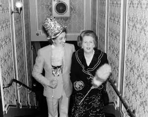 Comedian Ken Dodd clowning with a surprise member of the audience, Margaret Thatcher Comedian Ken Dodd clowning with a surprise member of the audience, Margaret Thatcher