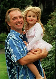 Comedian Rik Mayall with his youngest daughter Bonnie. 12th September 1998 Comedian Rik Mayall with his youngest daughter Bonnie. 12th September 1998