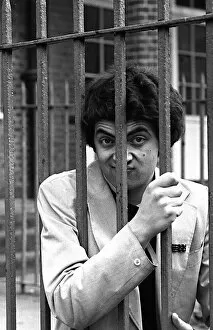 Comedian Rowan Atkinson behind bars April 1980