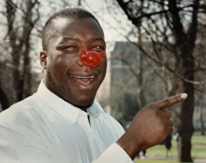 Comic relief. Former Boxing champion Gary Mason sports a comic red nose Comic relief. Former Boxing champion Gary Mason sports a comic red nose