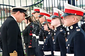Commander J Robertson inspects the guard of honour provided by the Marines detachment Commander J Robertson inspects the guard of honour provided by the Marines detachment