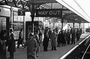 Commuters and schoolchildren on platform three of Kingston Station await the next train Commuters and schoolchildren on platform three of Kingston Station await the next train