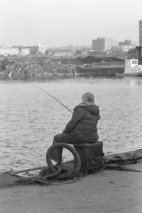 A competitor in the Daily MIrror Angling Competition at Surrey Docks, London A competitor in the Daily MIrror Angling Competition at Surrey Docks, London