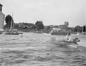 Competitor taking part in the Daily Mirror Handicap Trophy Race for outboard hydroplane Competitor taking part in the Daily Mirror Handicap Trophy Race for outboard hydroplane
