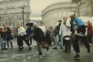 Images Dated 15th February 1994: Competitors strugging through snow and sleet to take part in the Shrove Tuesday Pancake