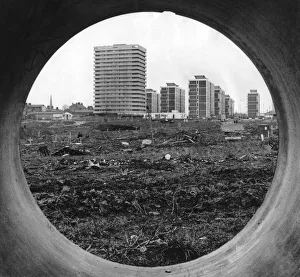 The concrete circle of a sewer pipe outlines the rapidly changing scene The concrete circle of a sewer pipe outlines the rapidly changing scene