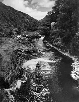 Images Dated 22nd February 2008: Coracle fishers on the River Teifi at Cenarth: Following a pattern evolved over two