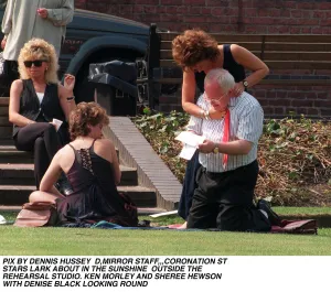 Coronation Street Stars Ken Morley Sheree Hewson and Denise Black larking around outside Coronation Street Stars Ken Morley Sheree Hewson and Denise Black larking around outside