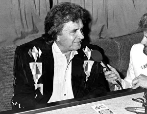 Country and Western singer Johnny Cash being interviewed before appearing at Bents Park Country and Western singer Johnny Cash being interviewed before appearing at Bents Park