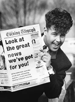 Images Dated 14th March 1991: Coventry singing nurse Mark Rattray holds up a new edition of The Coventry Evening