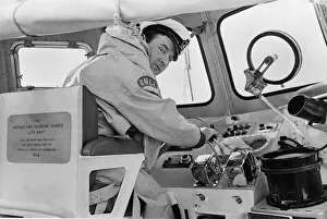 Coxswain Mr. Frank Tinsley seated at the controls of the Barry lifeboat during an Coxswain Mr. Frank Tinsley seated at the controls of the Barry lifeboat during an