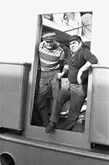 Crewman of the trawler Magritte seen here having a cigarette whilst tied up at St Andrews Crewman of the trawler Magritte seen here having a cigarette whilst tied up at St Andrews