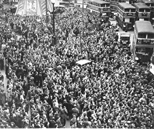 Crowd celebrating in Piccadilly Circus London on VE Day Crowd celebrating in Piccadilly Circus London on VE Day