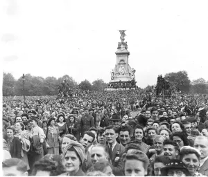 Crowd outside Buckingham Palace London on VE Day 1945 Celebrating victory in Crowd outside Buckingham Palace London on VE Day 1945 Celebrating victory in