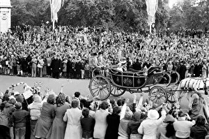 Images Dated 7th June 1977: Crowd waving to the carriage of Queen Elizabeth II and Prince Philip