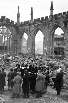 Crowds gather for a service inside the ruins of Coventry Cathedral after it was destroyed Crowds gather for a service inside the ruins of Coventry Cathedral after it was destroyed