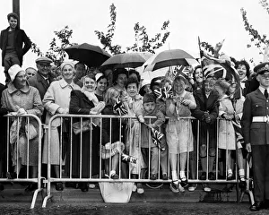 Crowds waiting to greet Queen Elizabeth II during her visit to Solihull in the West Crowds waiting to greet Queen Elizabeth II during her visit to Solihull in the West