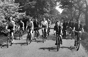 00078 Gallery: Cyclists out for a spin along a country lane near Belsay in Northumberland in 1950
