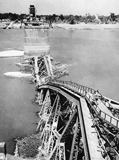 Damaged section of Ava bridge near Mandaley the only railway ridge over the Irrawaddy Damaged section of Ava bridge near Mandaley the only railway ridge over the Irrawaddy