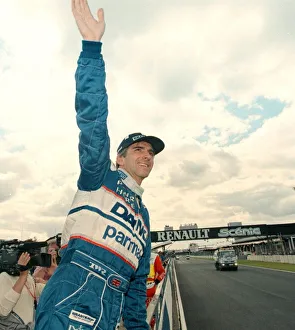 Damon Hill waves to the crowd after British Grand Prix July 1997 at Silverstone after