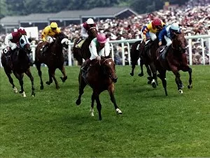Danehill wins with jockey Willie Carson from Nabeel Dancer (right
