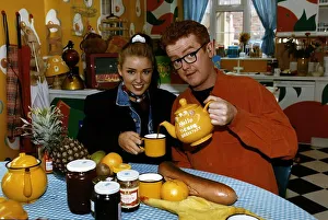 Images Dated 19th February 1993: Dannii i Minogue actress presenter and singer sits at breakfast