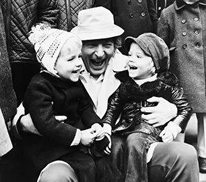 Images Dated 16th November 1971: Danny Kaye making two toddlers laugh in London - November 1971 Guy Murray