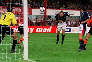 Dariusz Adamczuk Sept 1998 heads the equaliser for Dundee Dariusz Adamczuk Sept 1998 heads the equaliser for Dundee