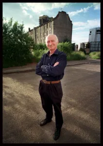 Dave Anderson actor June 1998 standing in the middle of road arms folded Dave Anderson actor June 1998 standing in the middle of road arms folded
