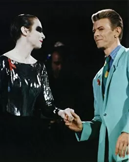 Images Dated 10th November 1995: David Bowie and Annie Lennox sing a duet at the Freddie Mercury Aids Concert at Wembley