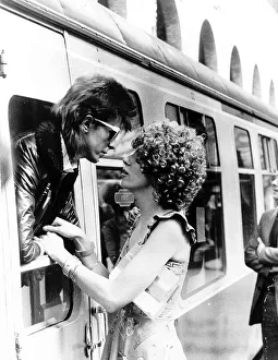David Bowie leaning out of a railway carriage of the Paris boat train at Victoria station David Bowie leaning out of a railway carriage of the Paris boat train at Victoria station