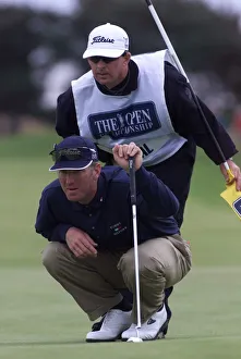 David Duval lines up a putt with his caddie July 1999 on the 11th green during David Duval lines up a putt with his caddie July 1999 on the 11th green during