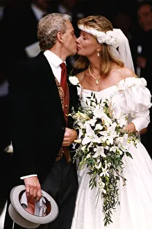 00479 Gallery: David Gower former cricket player kisses his new bride Thorrun Nash on the lips at their