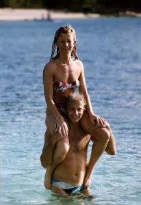 00479 Gallery: David Gower the former English Cricket player of Hampshire CCC carries his girlfriend