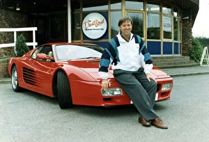 DAVID LLOYD AT THE DAVID LLOYD RACQUET CENTRE SITTING ON THE BONNET OF A RED FERRARI DAVID LLOYD AT THE DAVID LLOYD RACQUET CENTRE SITTING ON THE BONNET OF A RED FERRARI